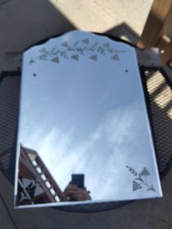 Vintage mildly distressed etched bathroom mirror