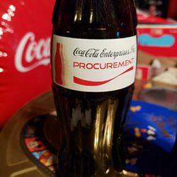Coca-Cola Enterprise Procurement employee bottle