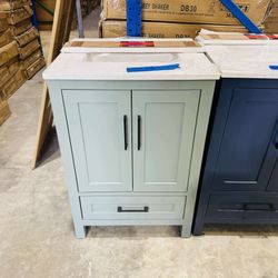 24 in Single Sink Bath Vanity in Sage Green with Vanity Top in White  $349 