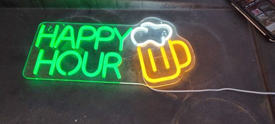 Previously Owned Plastic Neon Sign 