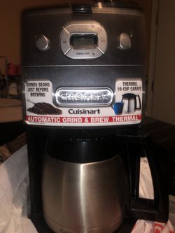 Coffee maker with coffee grinder