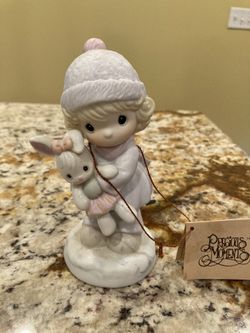 Precious moments porcelain figurine