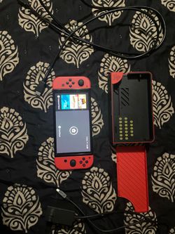 Nintendo switch OLED and dock plus games- Switch Mario Red edition