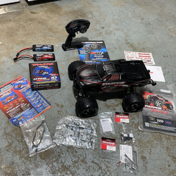 Gently Used Traxxas Stampede 4x4 Vxl brushless motor 2/3 cell battery EZ peak plus fast charger