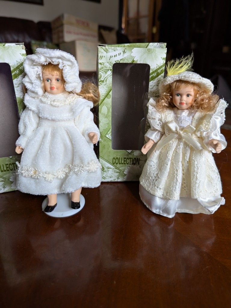 Porcelain Cracker Barrel Dolls