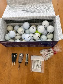 31 Mixed Brand Golf Balls, Tees, and Divot Tools
