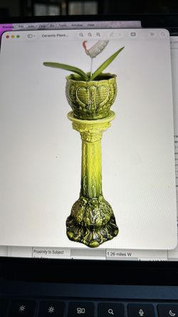 Green ceramic plant stand and pot