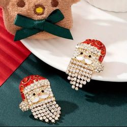 "Jolly Jingles: Cascading Crystal Santa Statement Studs"