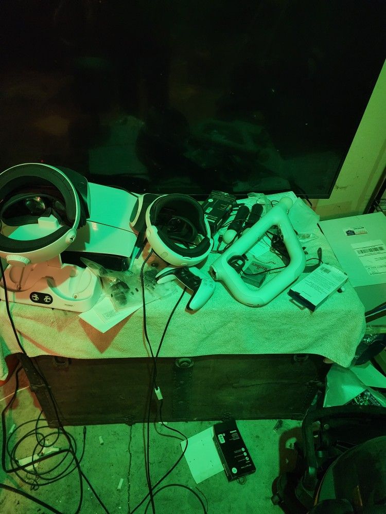 2 Controllers, Both VR Headsets. Psvr1 Gun And Wands And Camera. Psvr2 With Charging Stand As Well.