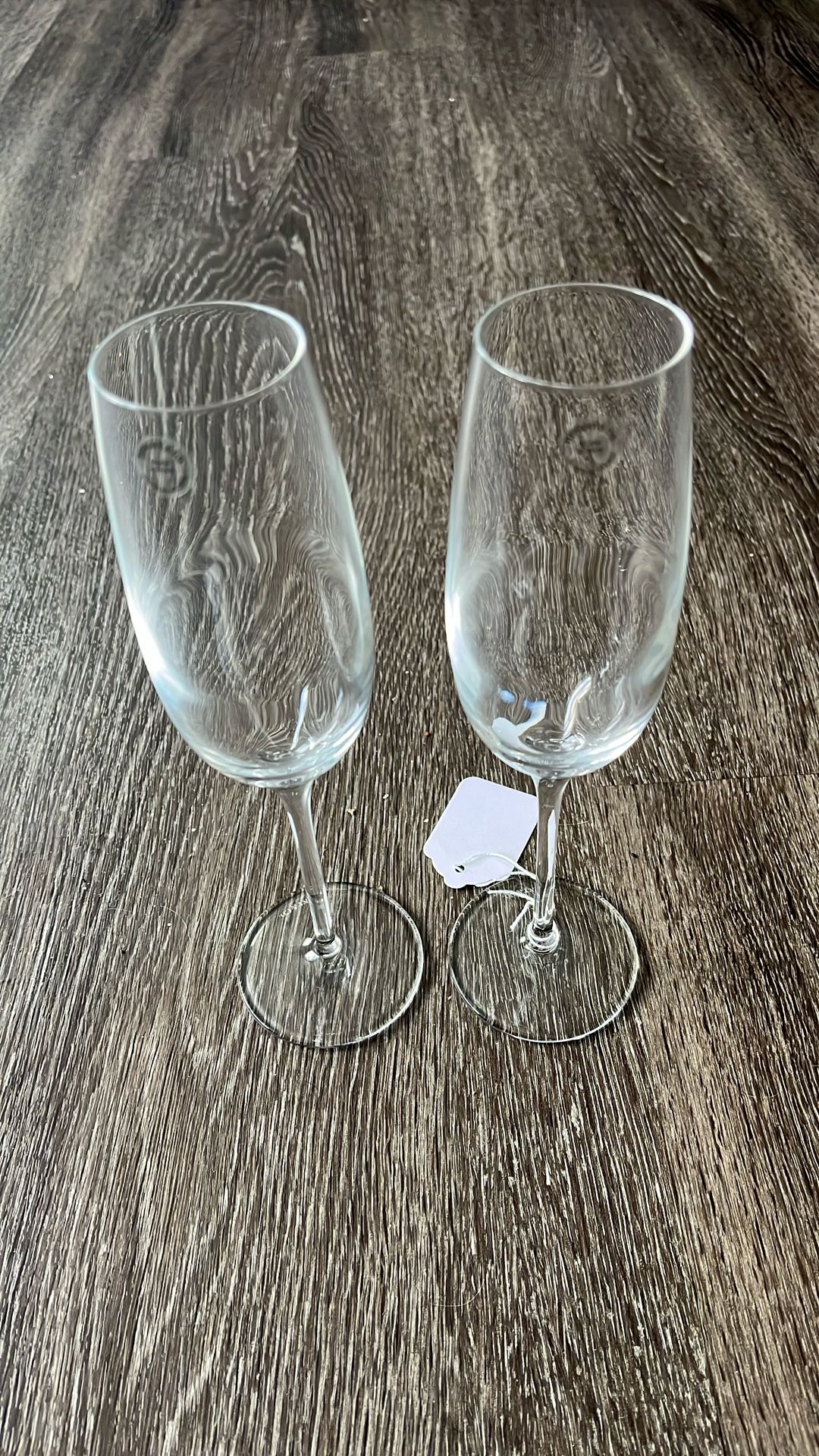 A pair of Tiffany, Crystal wine glasses