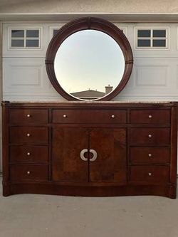Large Hard Wood Dresser with travertine top and Mirror