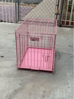 Pink dog / animal cage