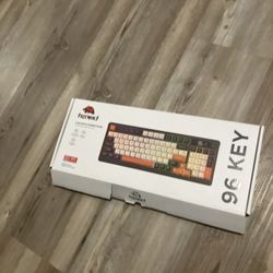 Firewolf M96, Orange, White, And Black, around 400mm x 160mm (or 15.7" x 6.3")