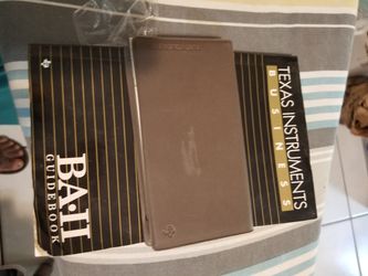 Texas instruments business calculator with owner manual.