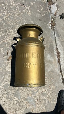 Old metal milk jug
