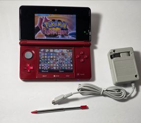 Red nintendo 3DS 64gb with pokemon Bank and 100+ games.