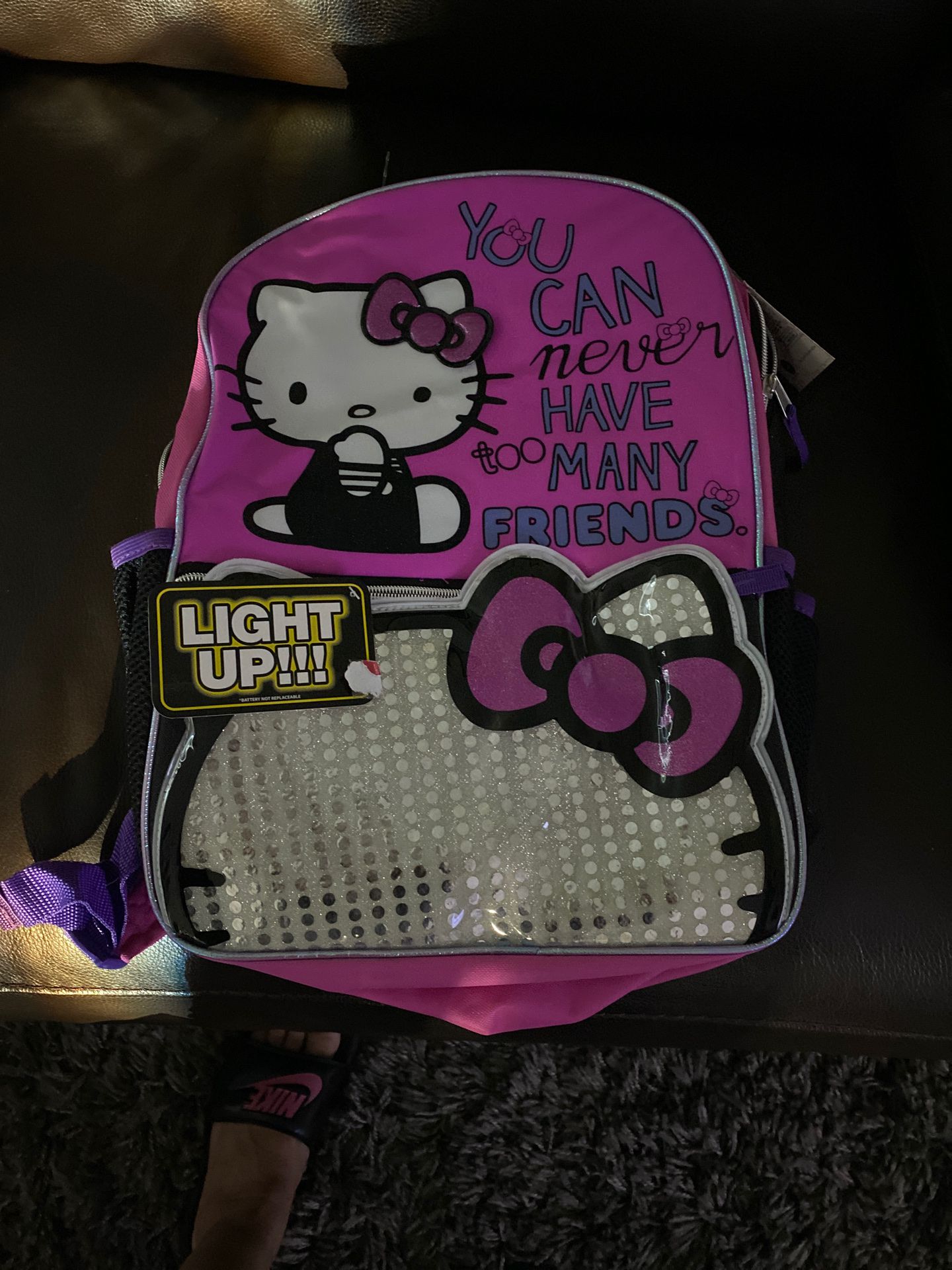 Brand new. Hello kitty back pack with lights