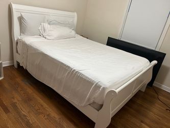 White solid wood bed frame and bed