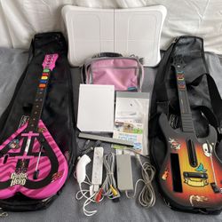 Wii with Guitars And Balance Pad