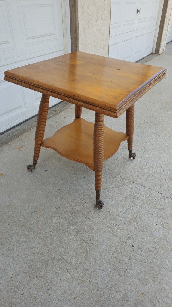 Antique Wood Table With Glass Casters