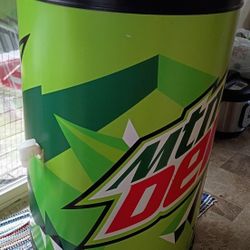 large, round, rolling Mountain Dew promotional cooler. 
