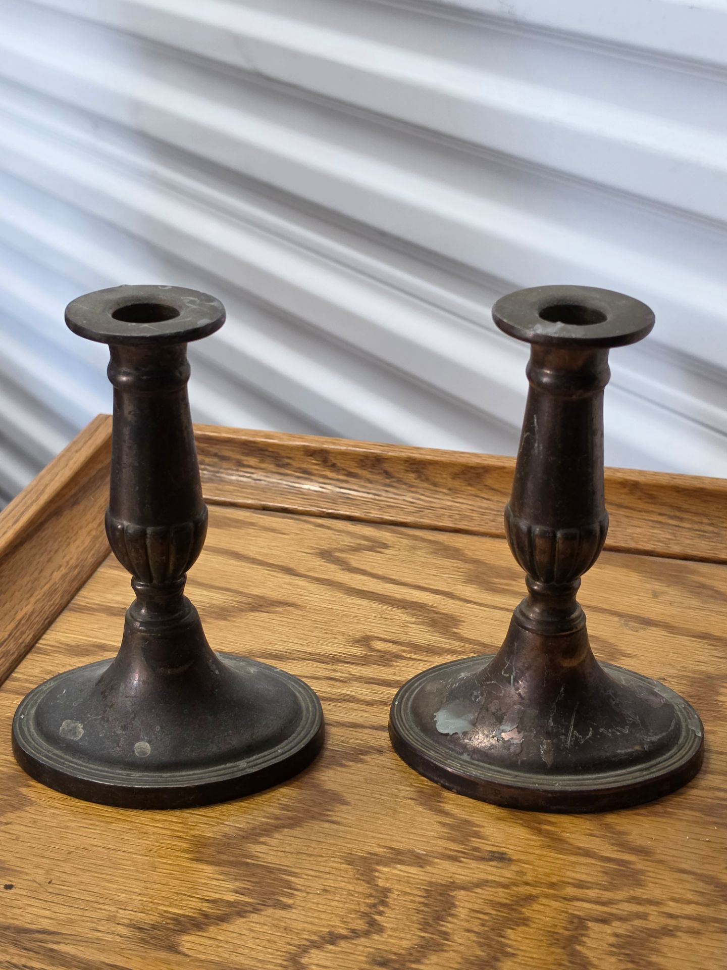 Antique Pair of brass candlestick holders.