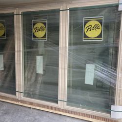 New Pella window , vinyl , almond , fixed , 83 by 54