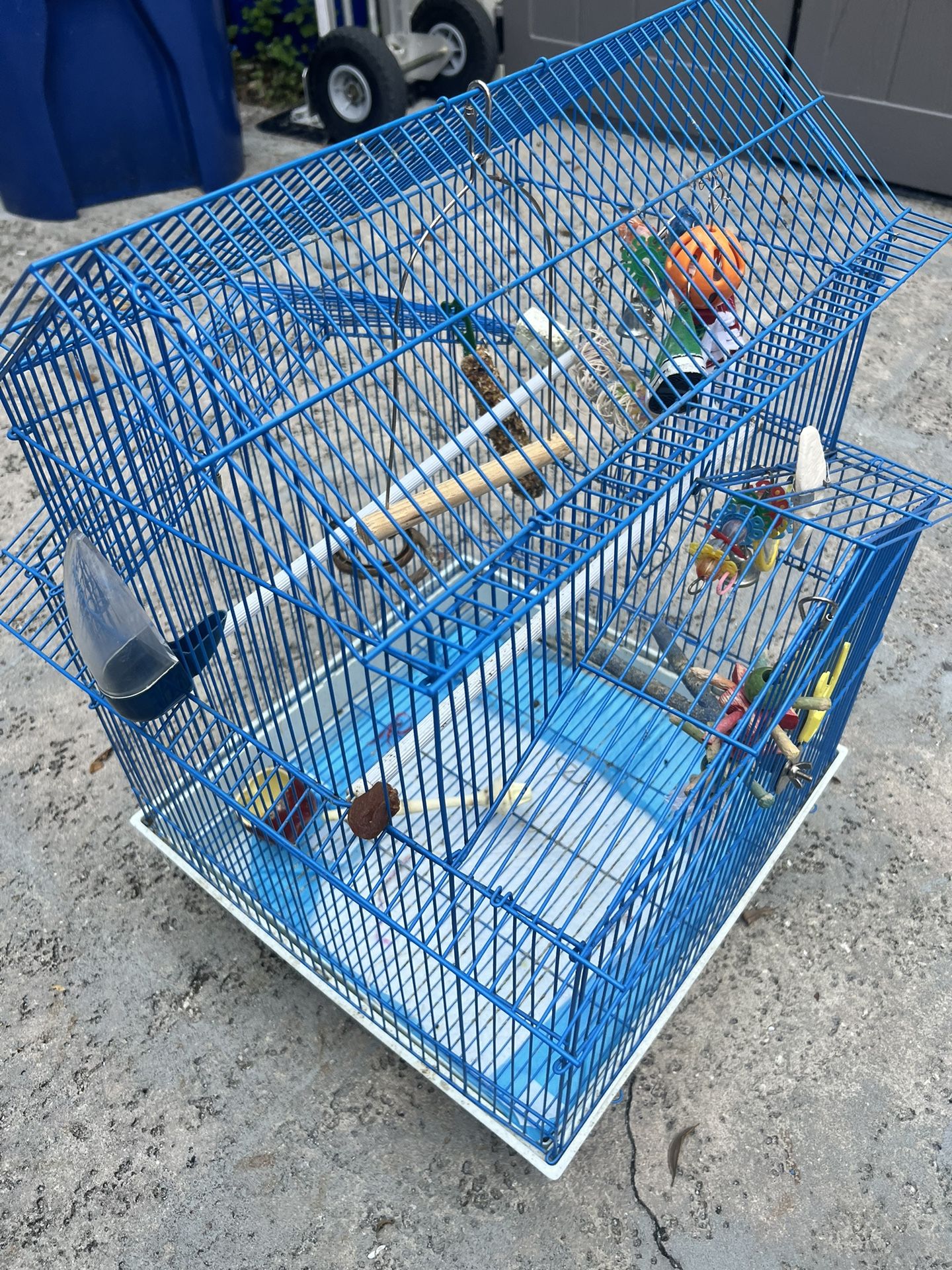 Used Blue Bird Cage with Toys and Accessories - Perfect for Your Feathered Friend!