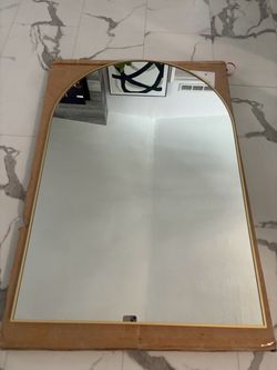 New gold trim arch mirror
