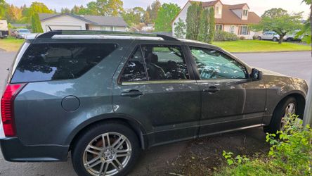 Lots of shiny seats n parts! AWD Cadillac 2007 SRX runs great!!