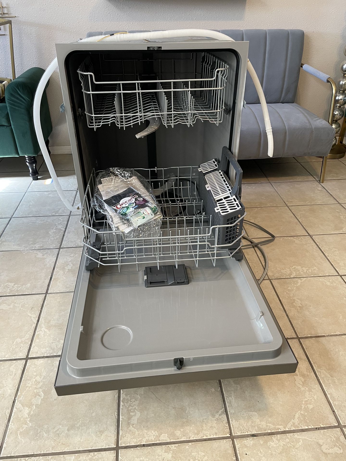 New stainless steel G&E dishwasher with water hose included