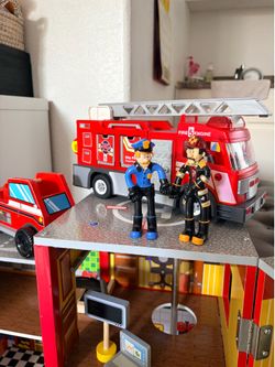 Kid Kraft foldable wooden play firefighter house
