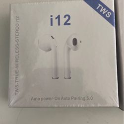 Fitbit Watch And Wireless Headphones