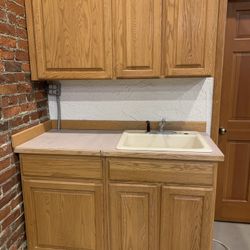 Oak Cabinets - $175