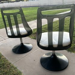 Space Age Lucite Swivel Chairs