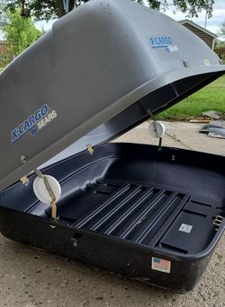 "x- cargo by sears model ; roof cargo box - gray  -48 in L x 24 in W".