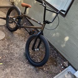 Fitbike,black bike with brown seat