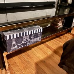 Coffee Table (black glass, gold colored , metal)