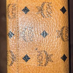 MCM Wallet Brown Leather Printed Gold-Tone Hardware Leather Lining & Six Interior Pockets with Card Slots Snap Closure