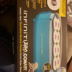 Conair infiniti pro instant heat ceramic 2inch roller setter. Comes with 8 plastic clips.