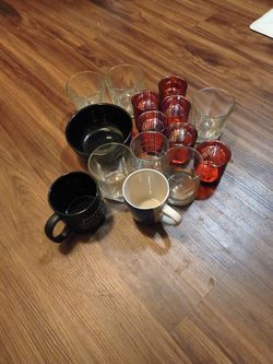 Lots of cups and glasses and bowl