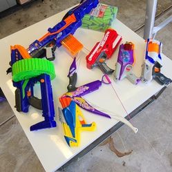 Collection of 7 NERF machine Gus
