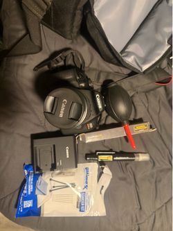 Canon EOS Rebel T7 DSLR Camera with EF-S 18-55mm f/3.5-5.6 IS II Lens