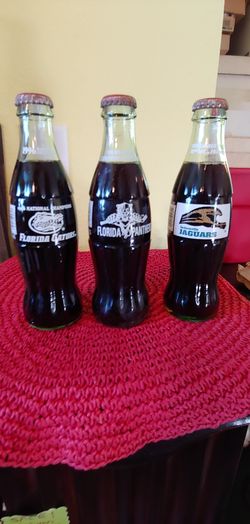3 COLLECTIBLE COKE BOTTLES