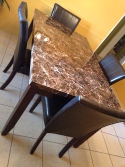 Fake marble dinning set with 4 chairs