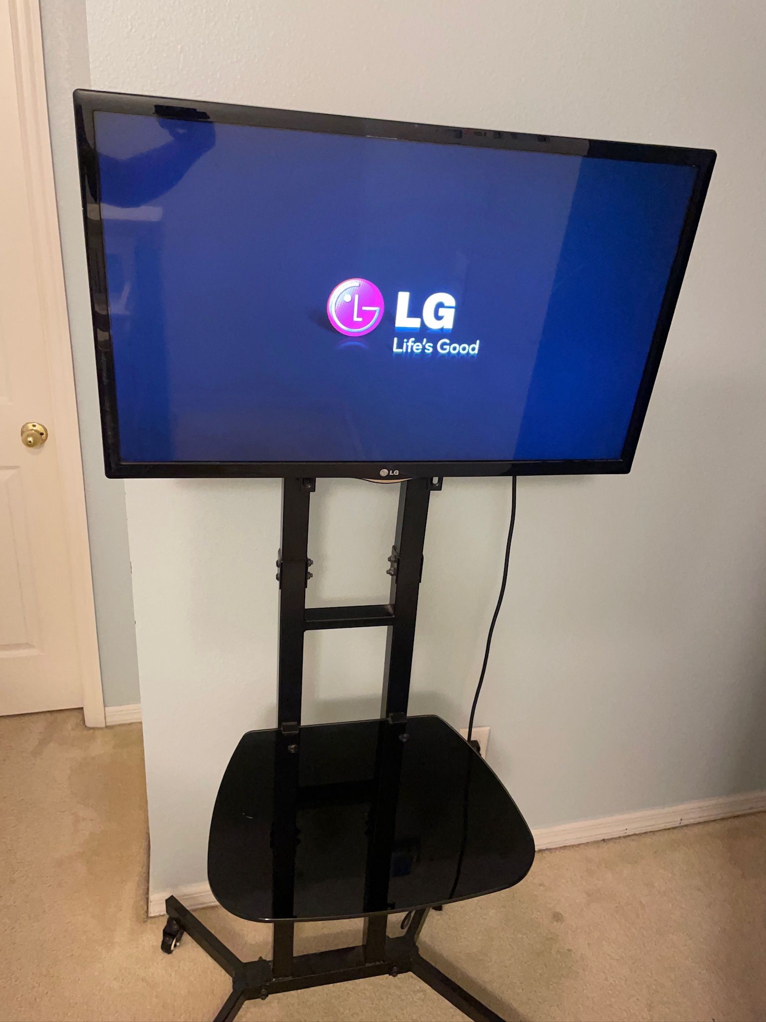 TV Stand with remote and TV