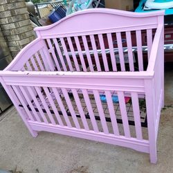 PINK CRIB ....GOOD OKAY CONDITIONS