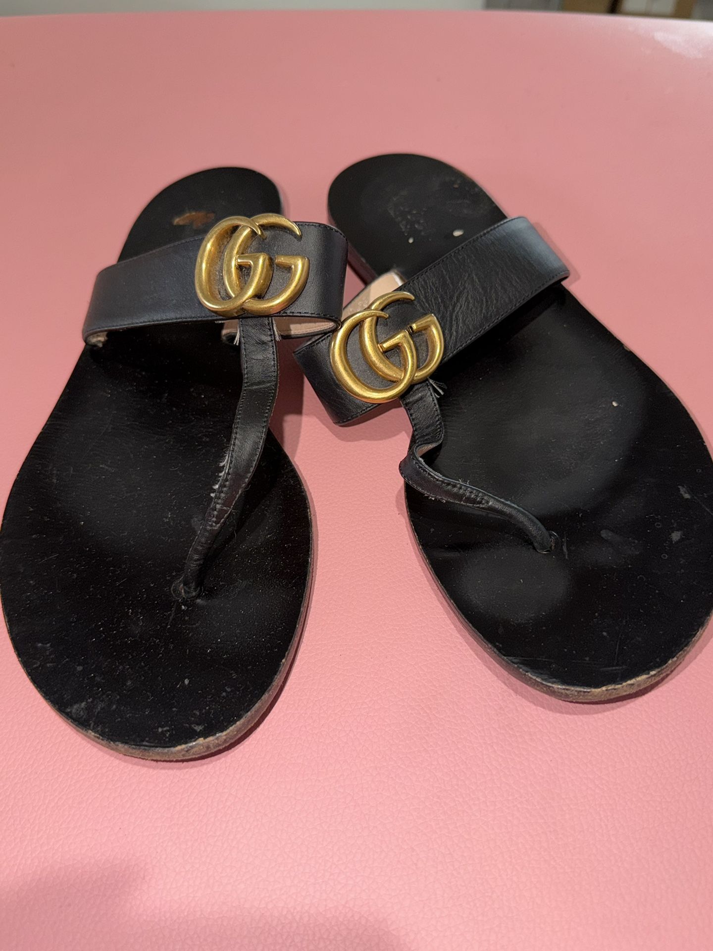 Gucci GG Marmont Leather Thong Sandals (women’s).