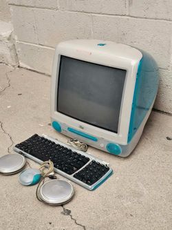 Apple iMac G3 in Bondi Blue, "Nearly bankrupt, Apple's official turnaround 1997