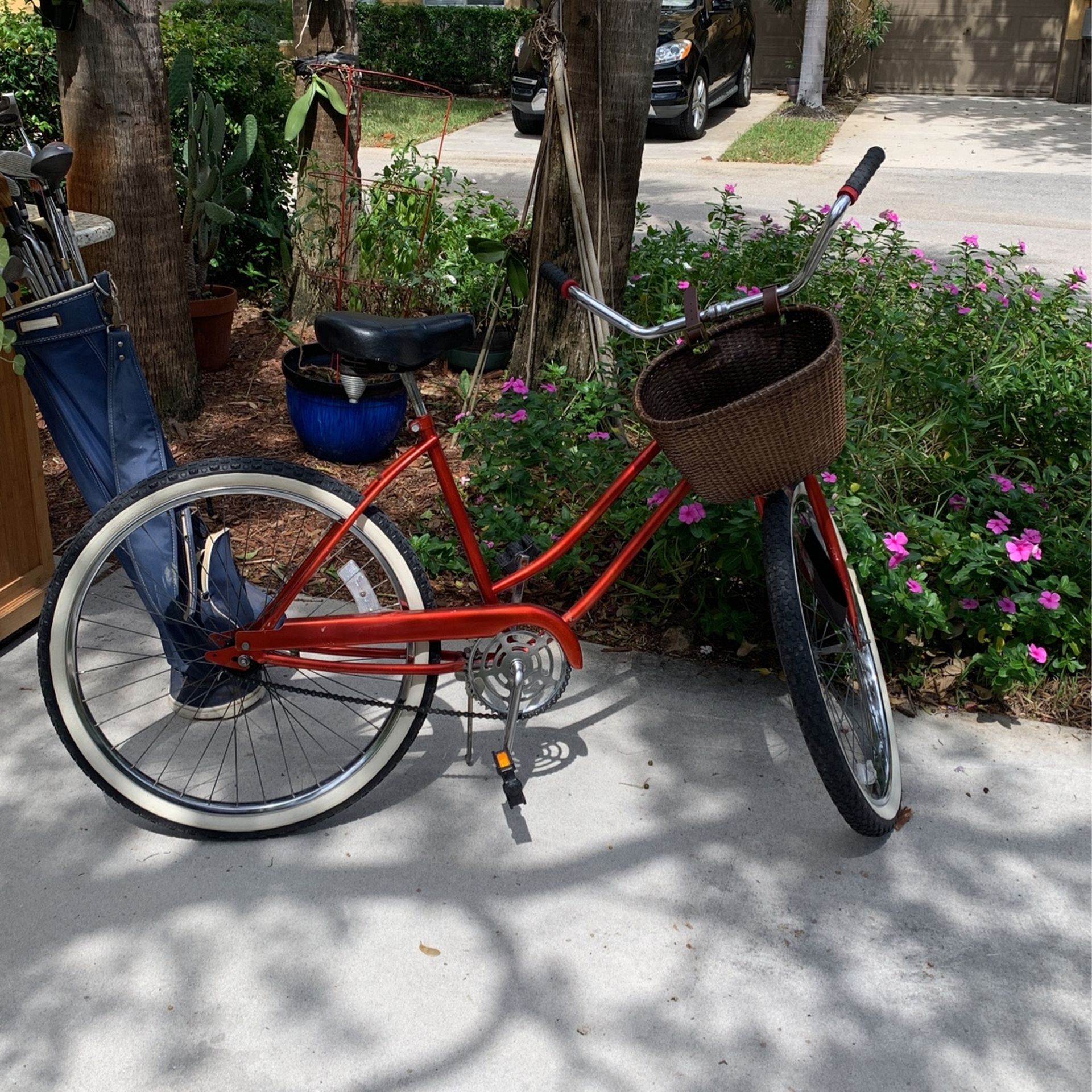 red beach cruiser with basket